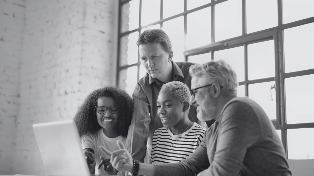 one of bastians contractors engaging in team development, supporting 3 other staff members in acquiring specialist knowledge from the experience they bring